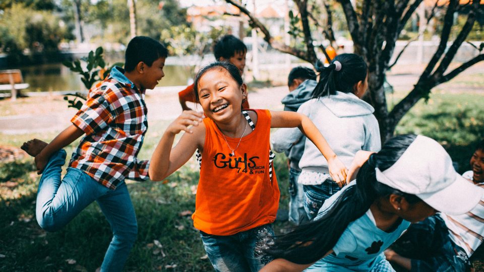 girl running while laughing